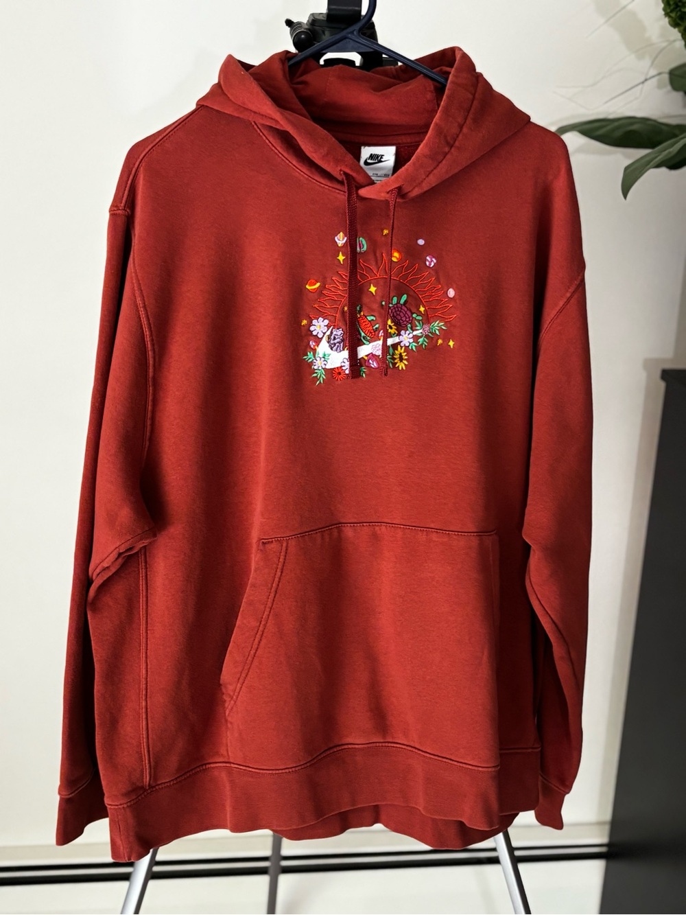 Nike Women's Rust Crewneck Hoodie with Floral Sun Graphic